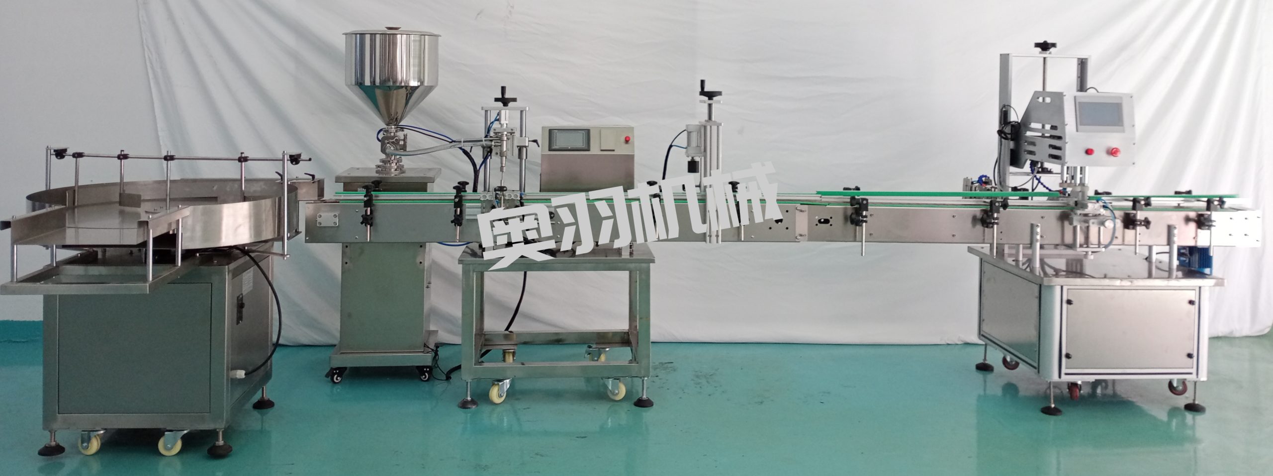 小型液體自動(dòng)灌裝旋蓋流水線(xiàn)_http://m.lntfjy.com_瓶裝灌裝生產(chǎn)線(xiàn)系列_第1張